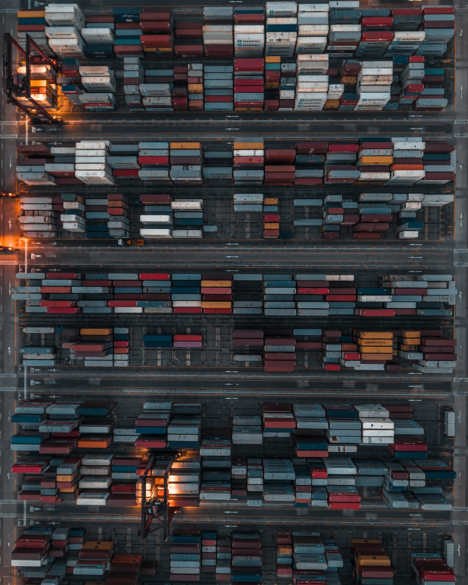 Aerial view of a container yard at dusk